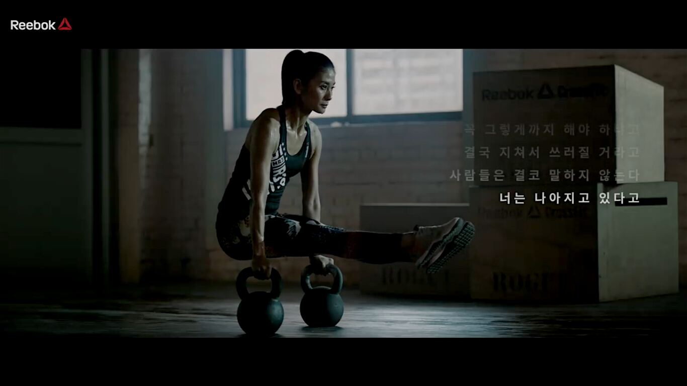Athlete training with kettlebells in the Reebok Be More Human film